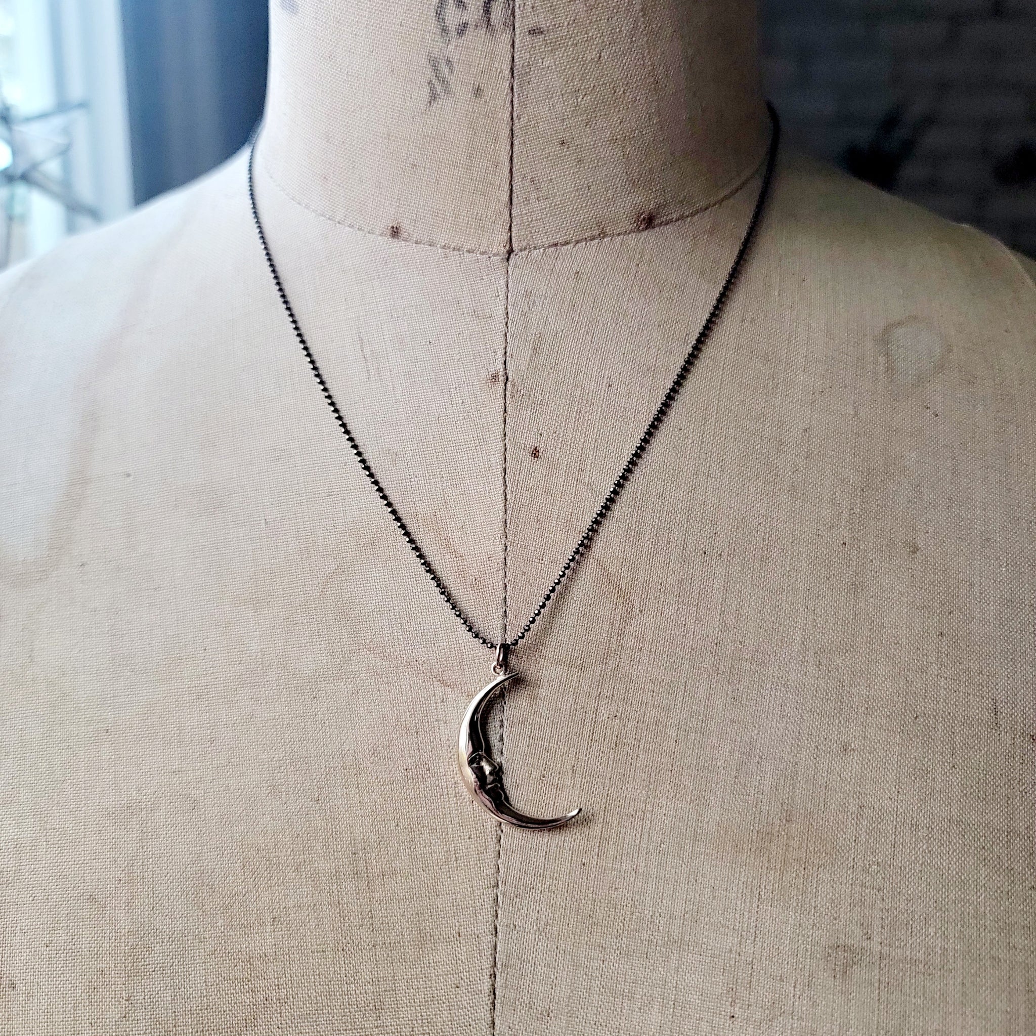 Man on the Moon Bronze Crescent Pendant