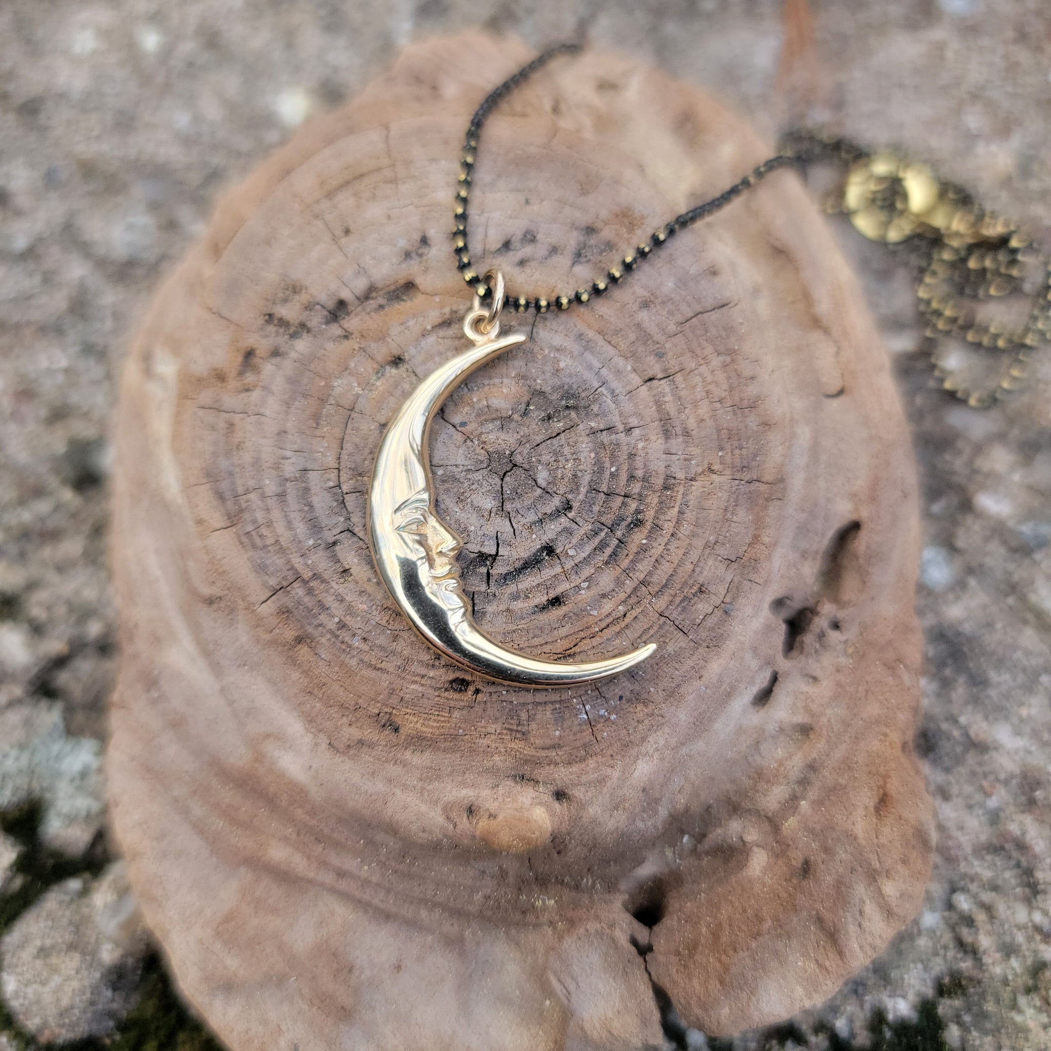 Man on the Moon Bronze Crescent Pendant