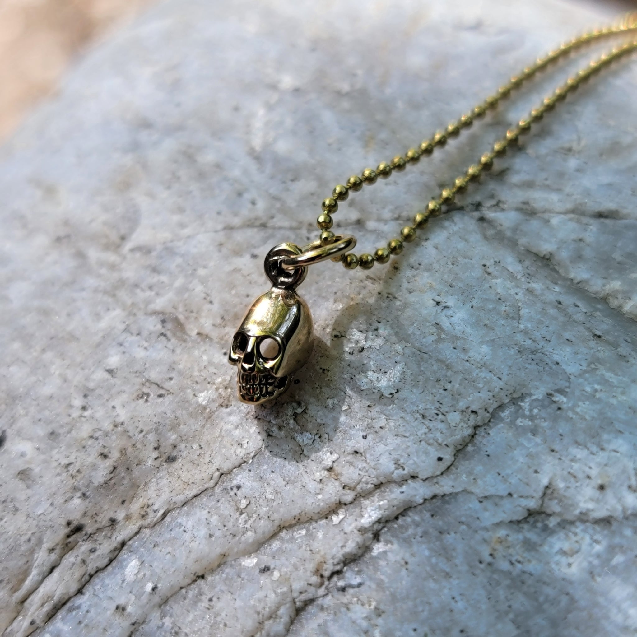 Mini Bronze Skull Pendant