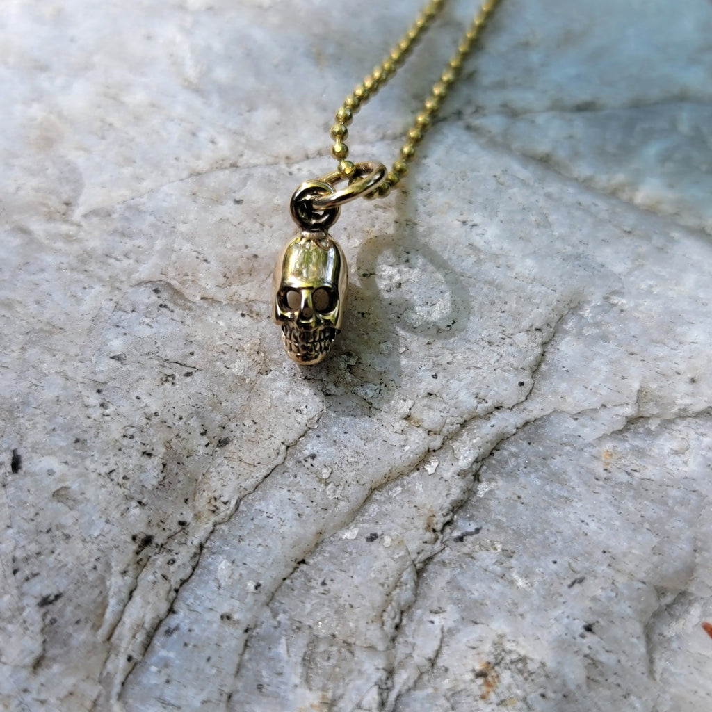 Mini Bronze Skull Pendant