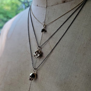 Mini Bronze Skull Pendant